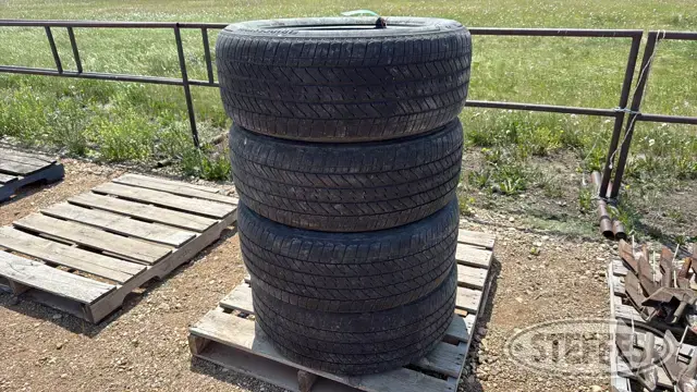 (4) Bridgestone 275/50R22 tires