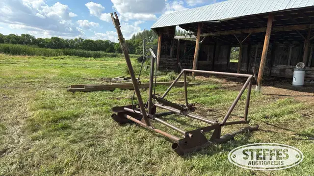 Shop-built bale unroller