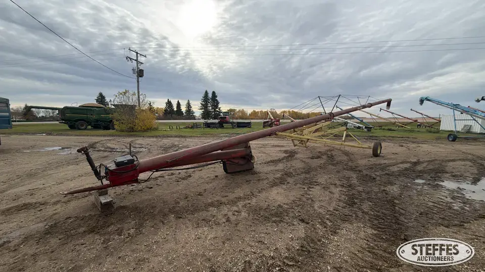 Farm King swing hopper auger