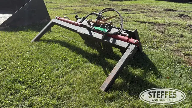 Skid steer tire grabber