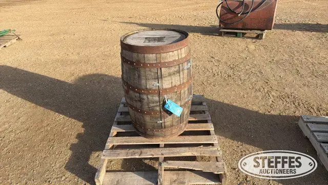 Oak whiskey barrel cabinet