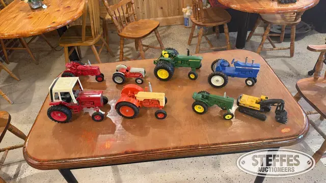 (7) Diecast tractors