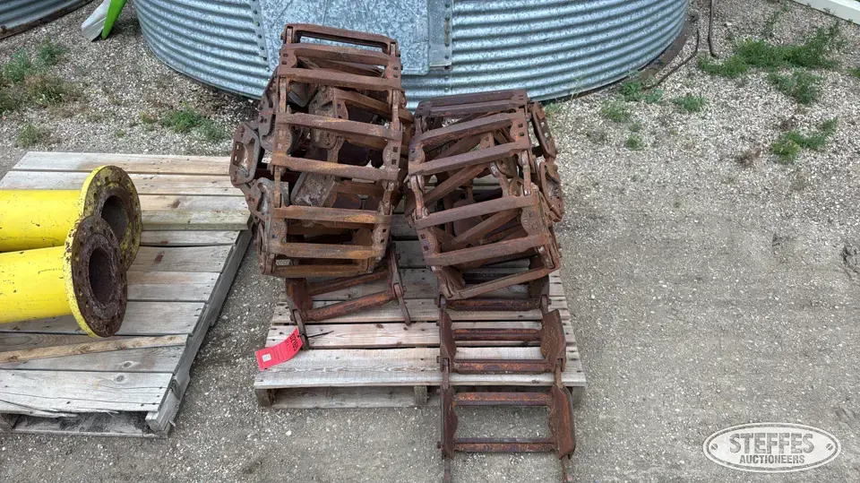 (2) John Deere 147E steel tracks