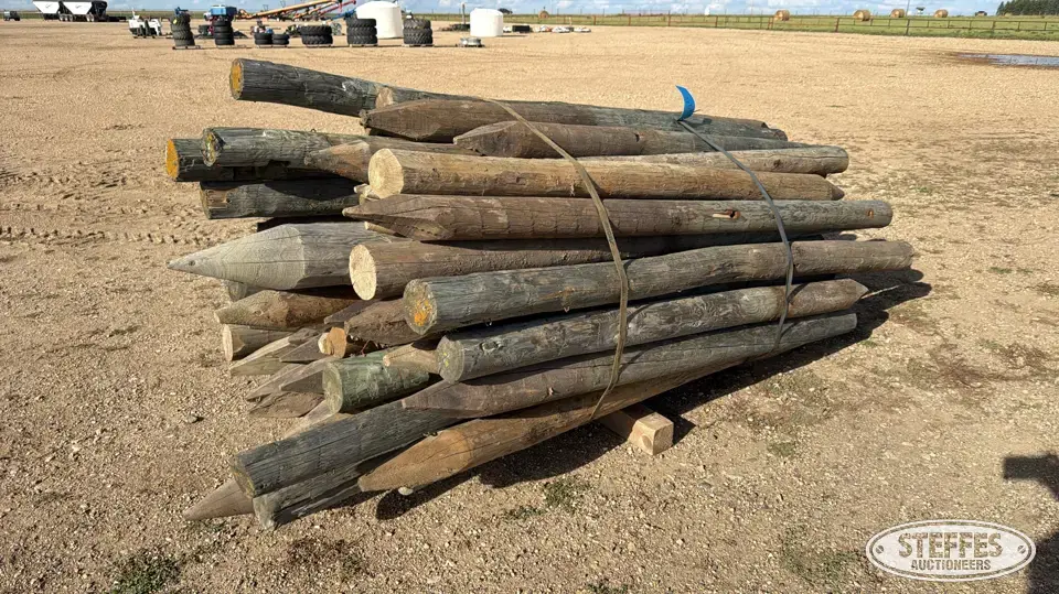 Approx. (70) wood posts Farm Support Item