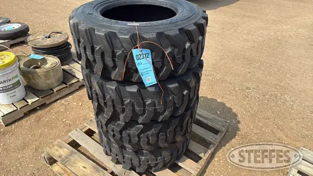 (4) Top Trust 10-16.5 skid steer tires
