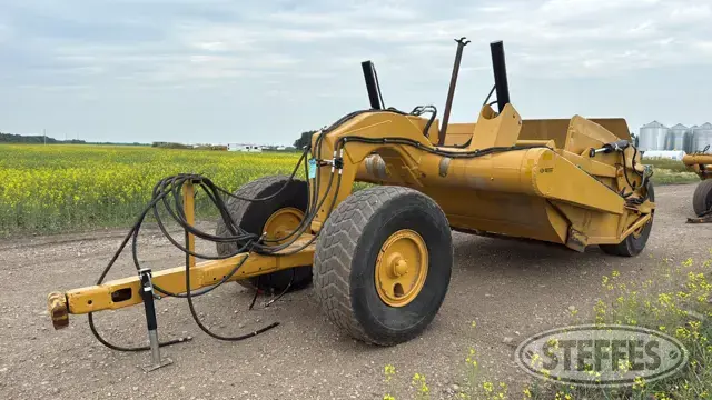 Pull scraper