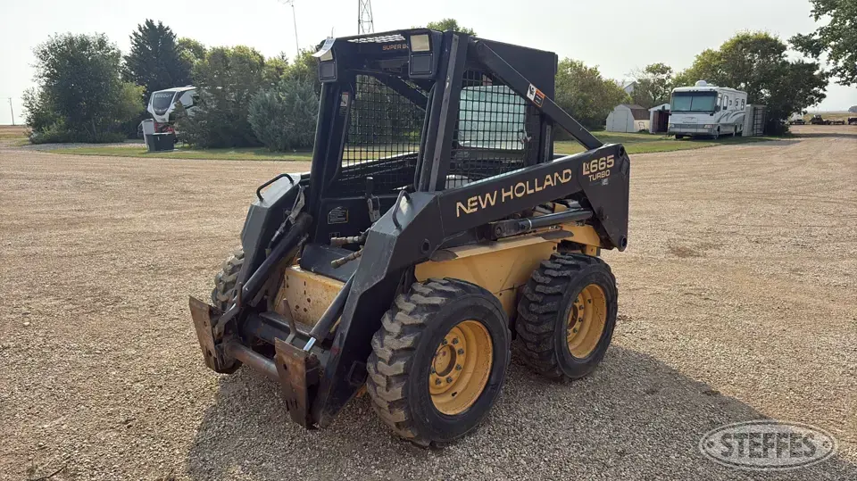 1997 New Holland LX665 Wheeled Skid Steer