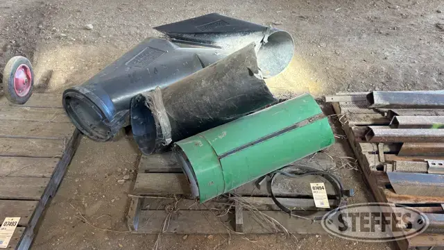 Combine auger spouts