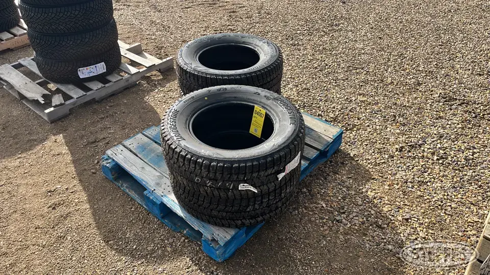 (4) Bridgestone Blizzak 235/65R16 tires Passenger-Light Truck Tire