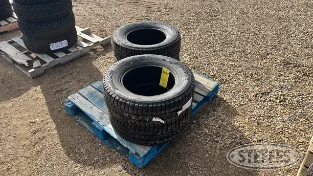(4) Bridgestone Blizzak 235/65R16 tires