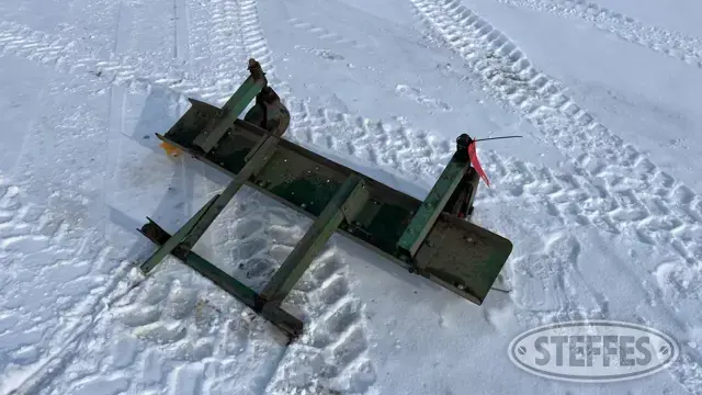 John Deere thatcher