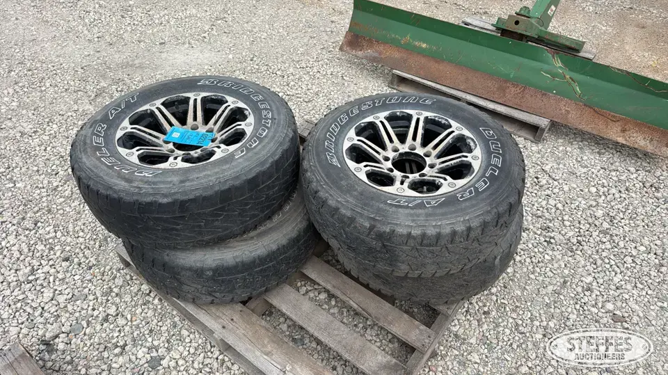 (4) Bridgestone A/T 265/70R17 tires Passenger-Light Truck Tire
