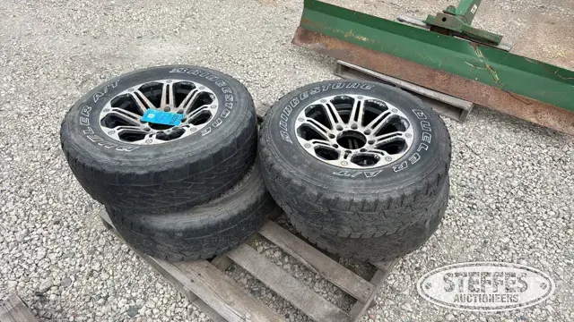 (4) Bridgestone A/T 265/70R17 tires