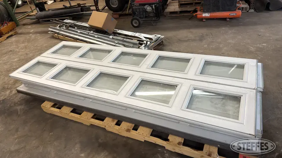 (2) Midland overhead garage doors General Business Support Item