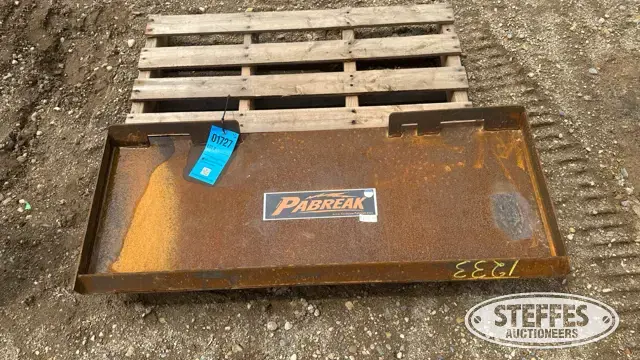 Pabreak skid steer plate