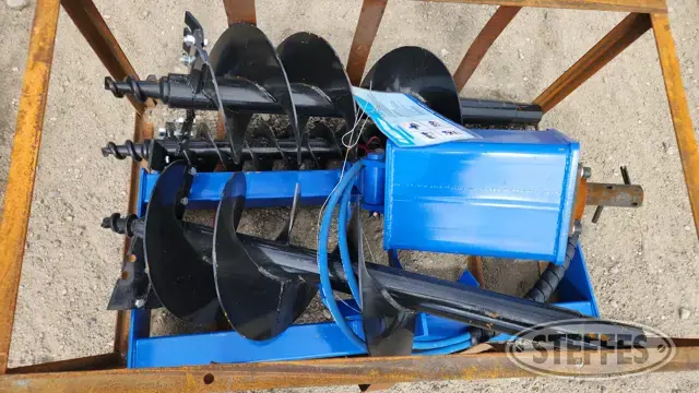 Post hole auger skid steer attachment