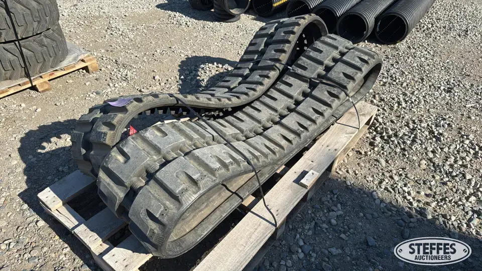 (2) Skid steer tracks