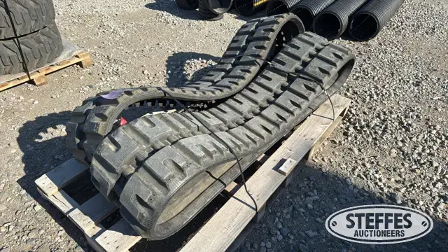 (2) Skid steer tracks