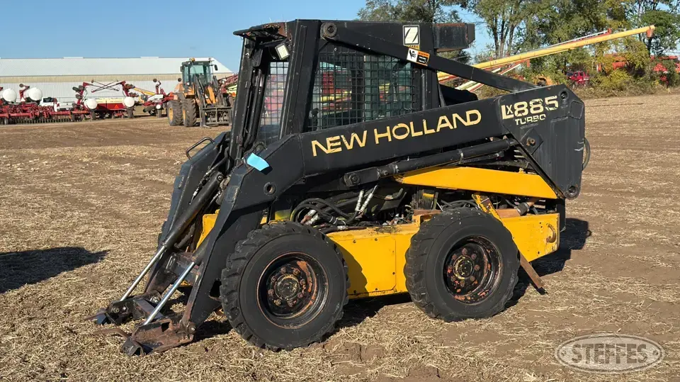 1995 New Holland LX885 Wheeled Skid Steer