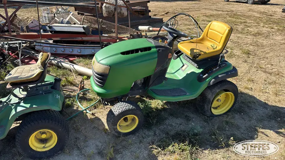 (2) John Deere riding lawn mowers Farm Support Item