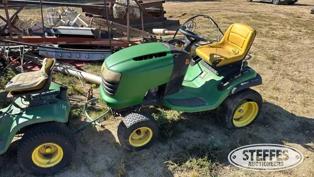 (2) John Deere riding lawn mowers