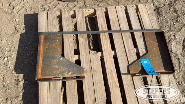 Skid steer plate