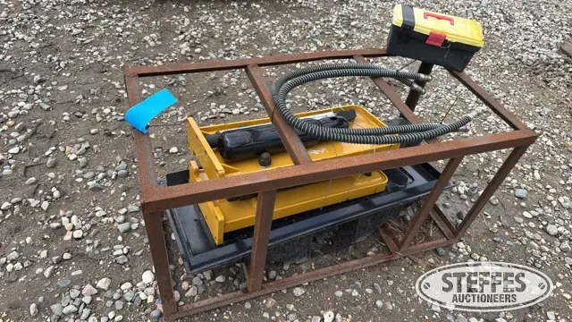 Skid steer breaker