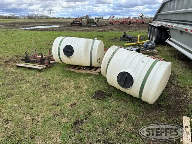 (2) 200 gal. poly saddle tanks