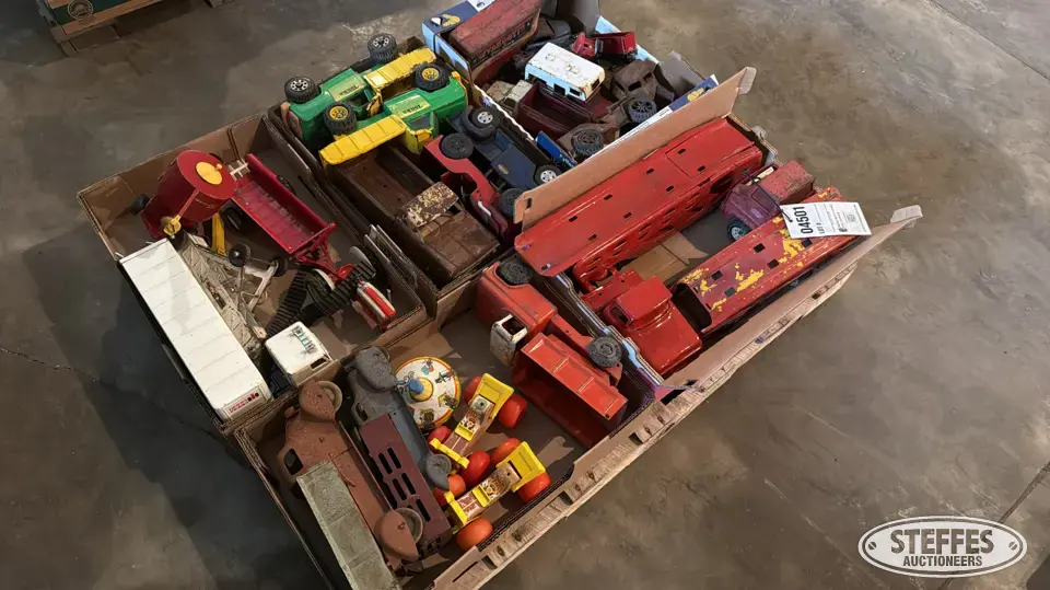 Toy tractors and trucks