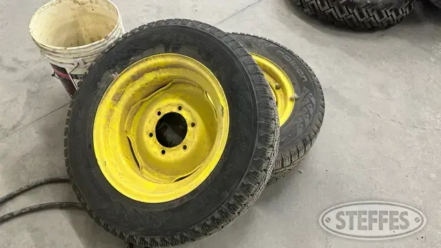 (2) John Deere snow tires