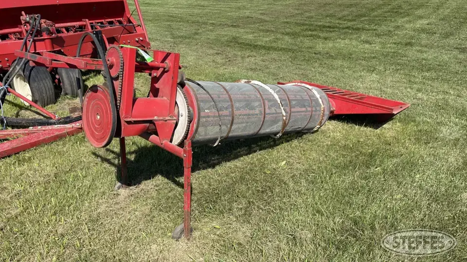 Rotary grain screener