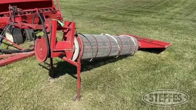 Rotary grain screener