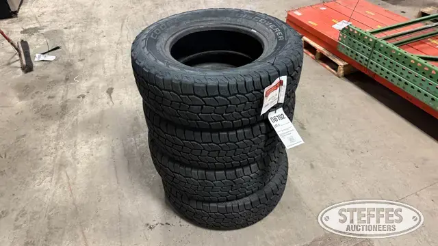 (4) Cooper Discoverer 235/70R16 tires