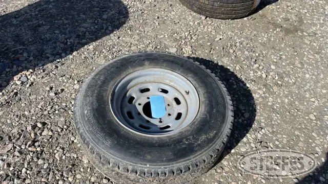(1) Firestone 235/85R16 tire