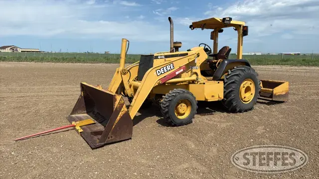 2000 Deere 210LE