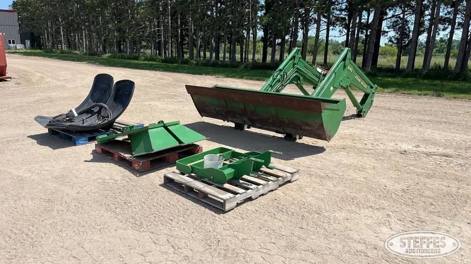 John Deere 840 Tractor Loaders and Attachment