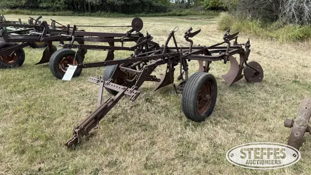 International 3-bottom plow