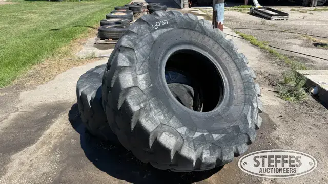 (2) Firestone 23.5-25 tires