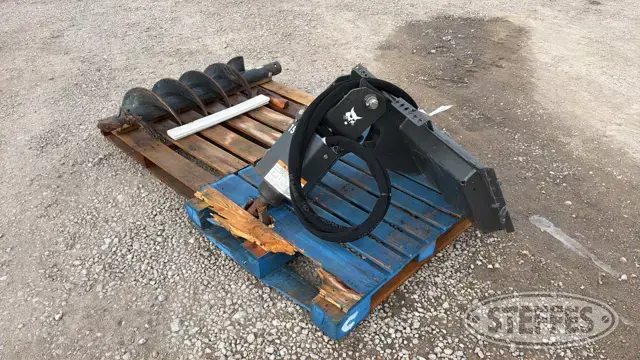 2015 Bobcat 15C skid steer post hole auger