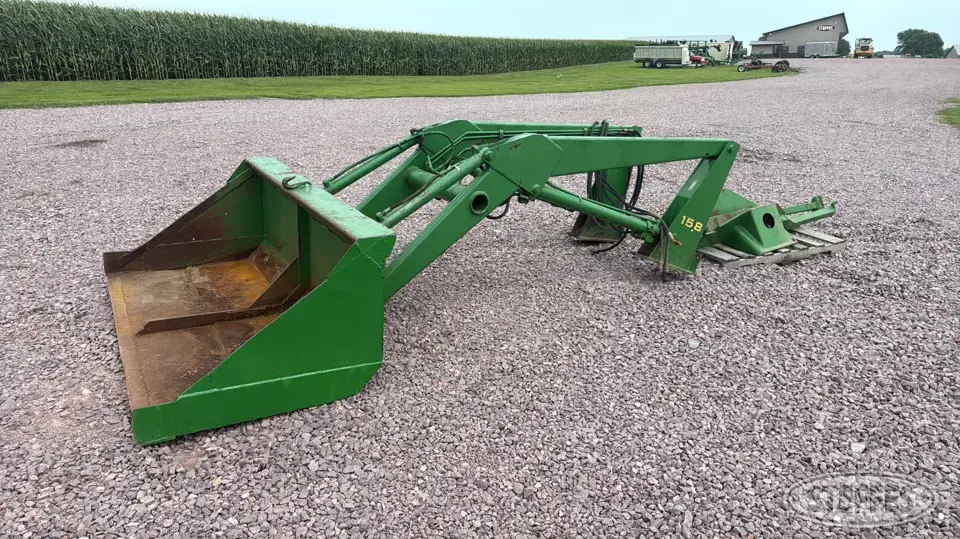 John Deere 158 Tractor Loaders and Attachment