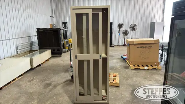Sliding door storage cabinet