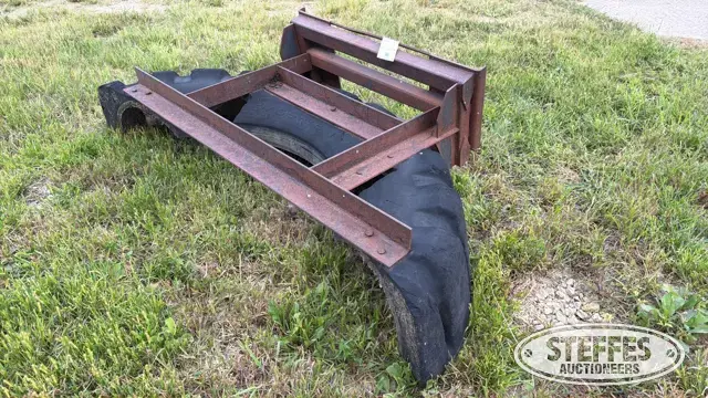 Skid steer pusher