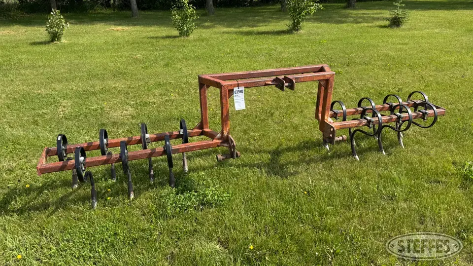 Shop-built track wacker Strip Tillage