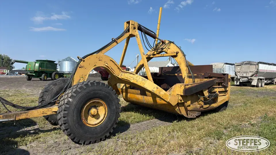 Pull scraper