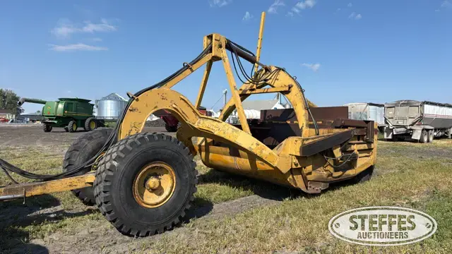 Pull scraper