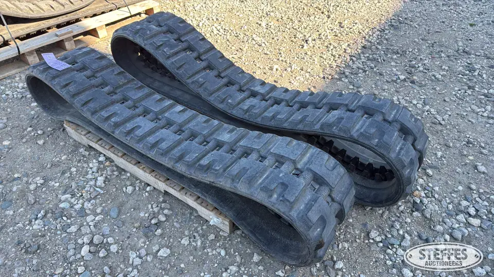(2) Skid steer tracks