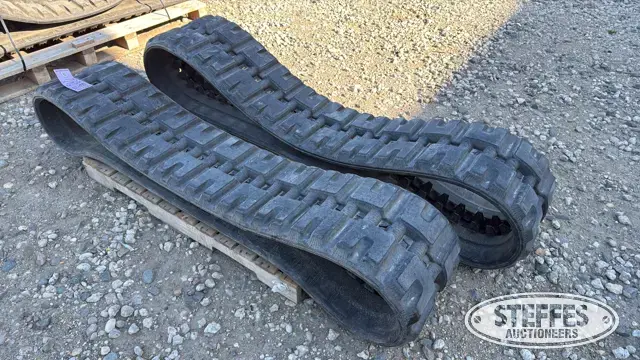 (2) Skid steer tracks
