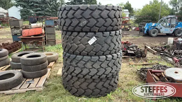 (4) Titan MXL 20.5R25 tires