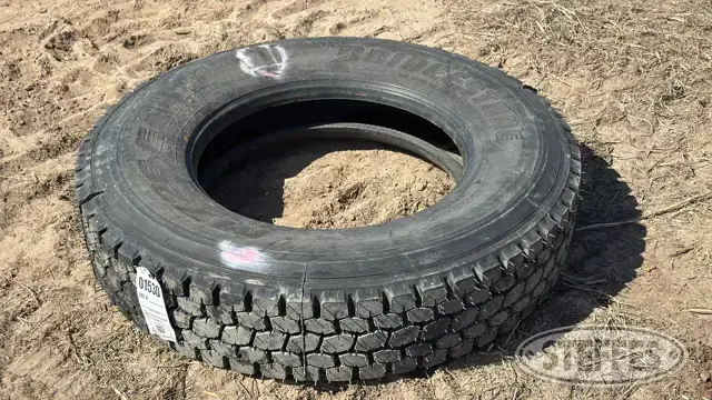 (1) Bridgestone 11R24.5 tire