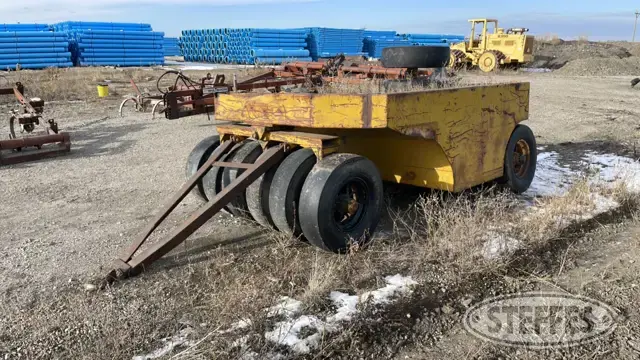 Pneumatic wheel roller